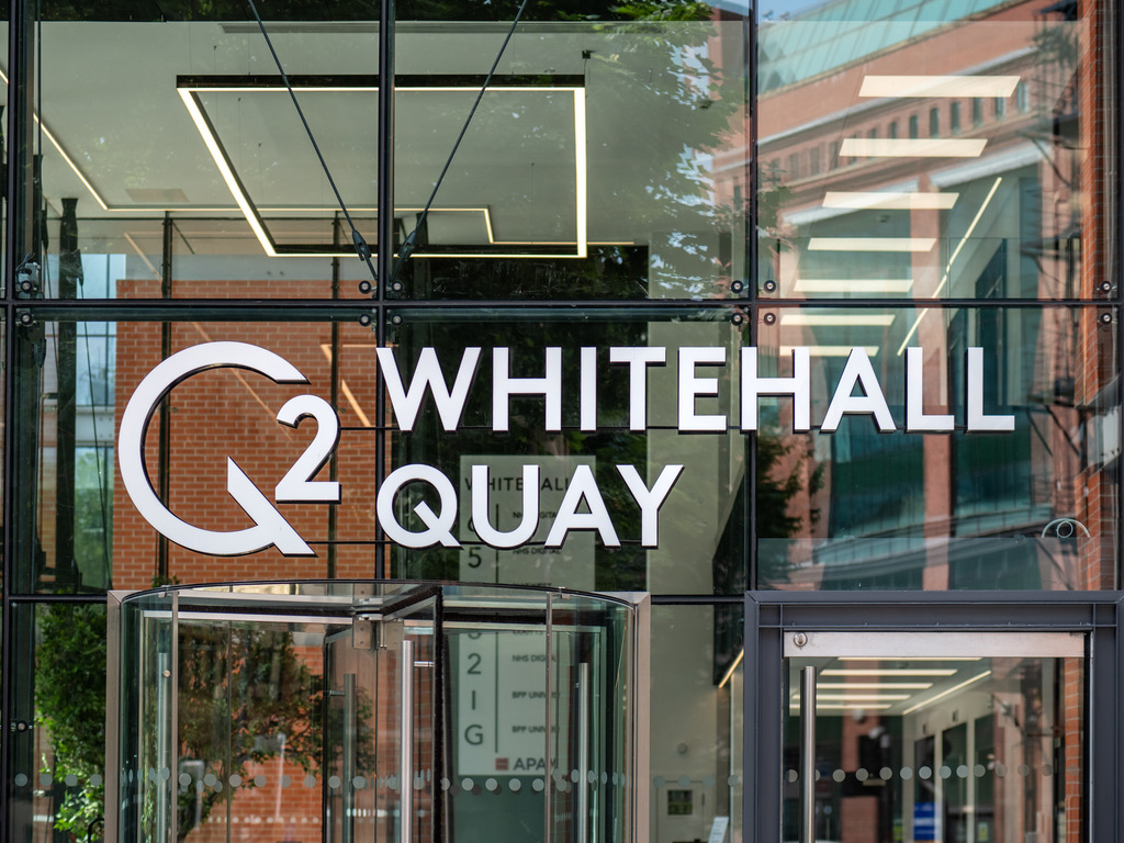 2 Whitehall Quay — glazed facade entrance with linear LED visible through glass