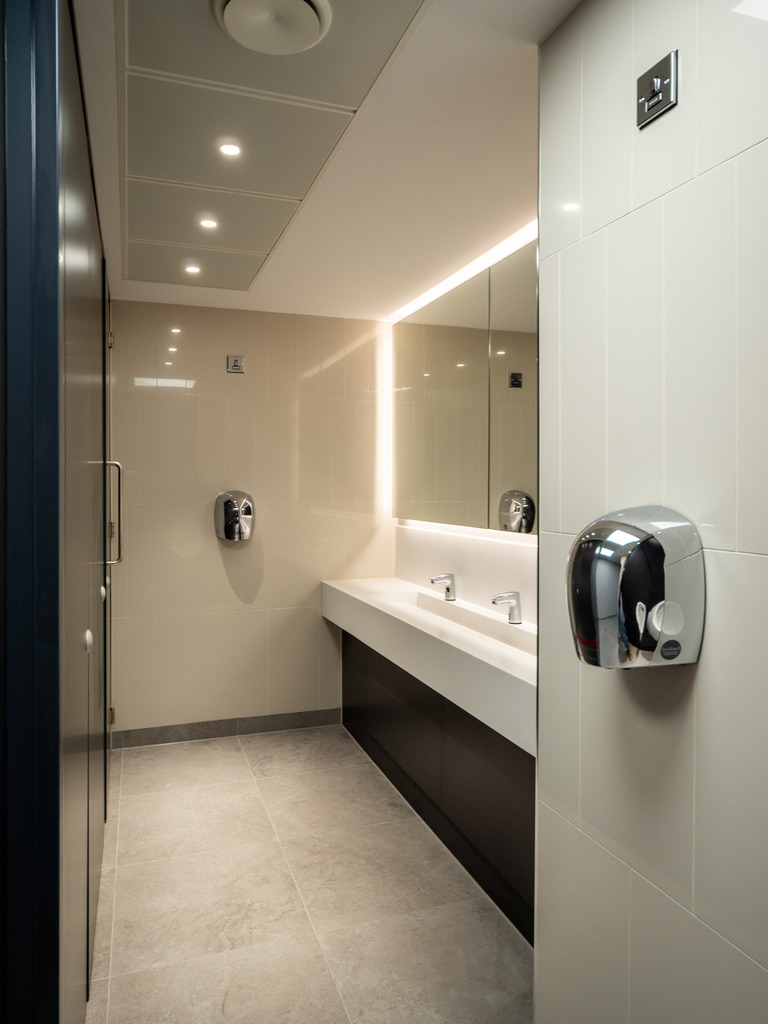 2 Whitehall Quay — washroom with Aqform recessed downlights and illuminated mirror strip