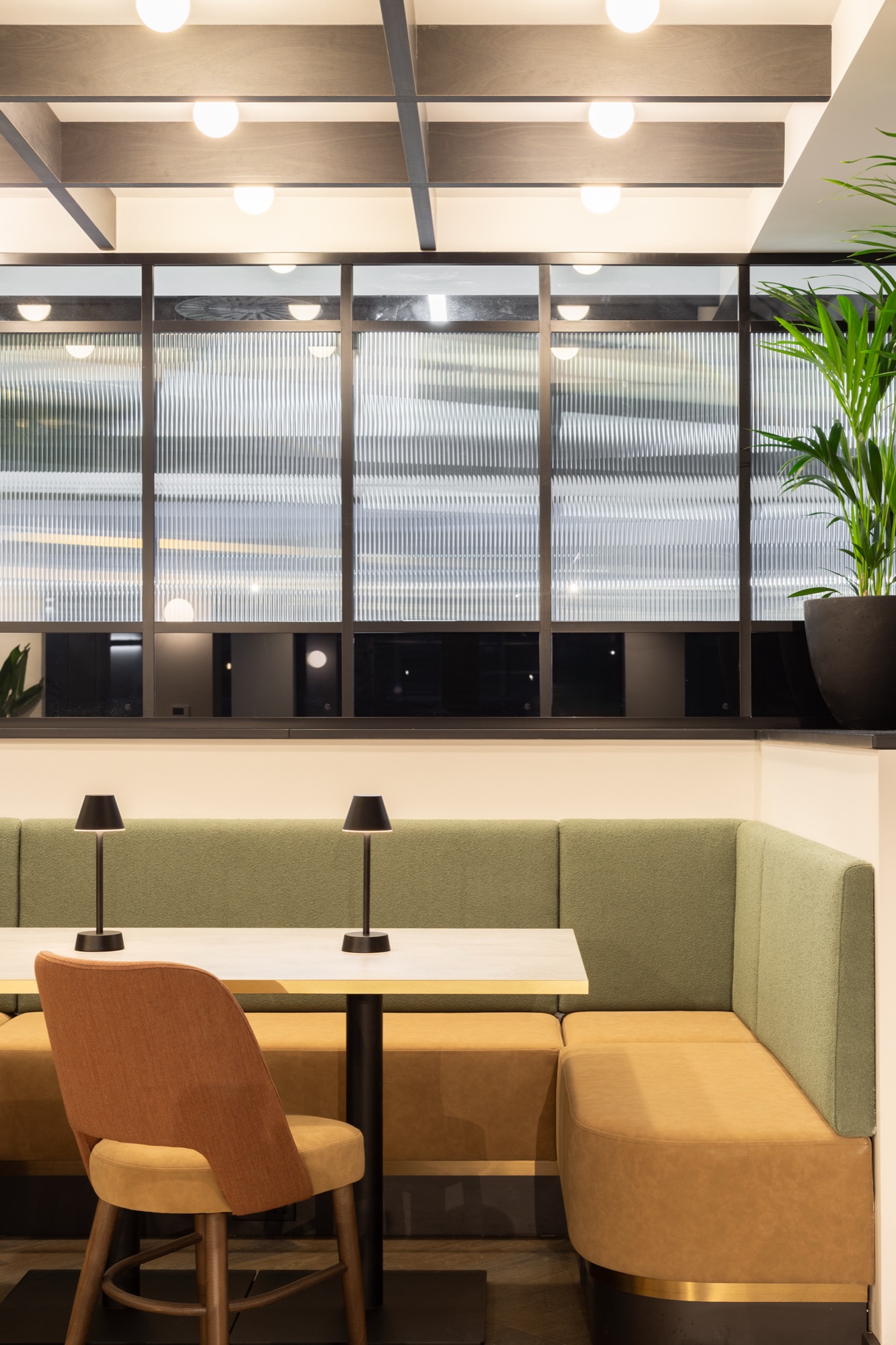 Executive suite with layered lighting design