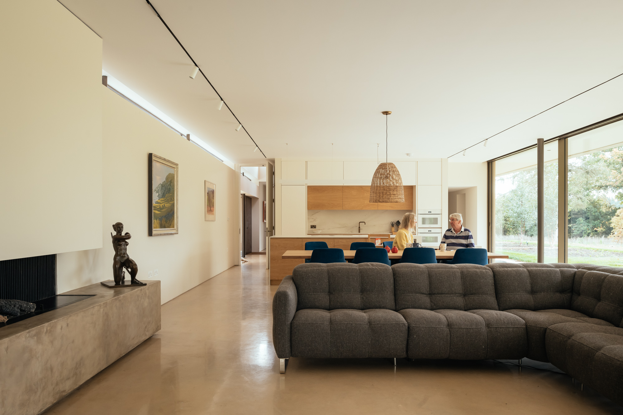 Clayworth interior — corridor and circulation with precision lighting