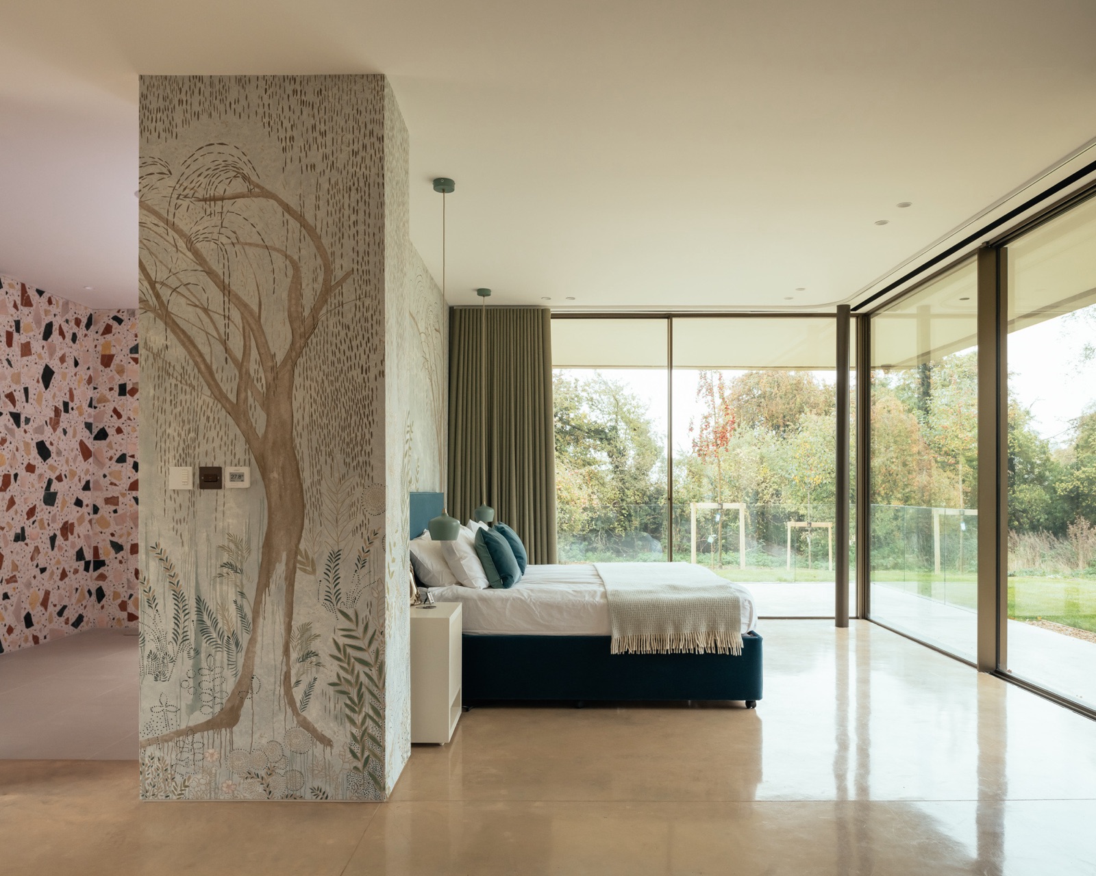 Clayworth — master bedroom with Deltalight recessed lighting and floor-to-ceiling glazing