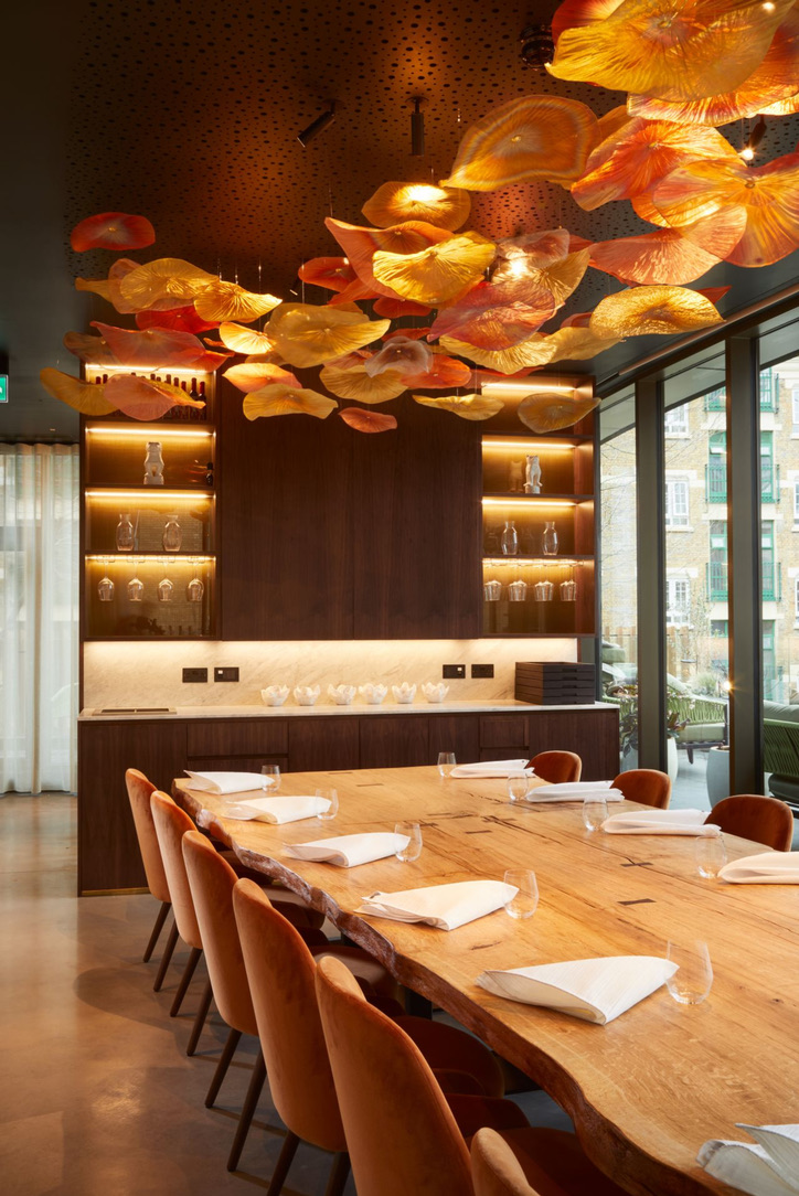 Restaurant Story — chef's table with Aqform trimless ceiling lighting and sculptural ceiling installation
