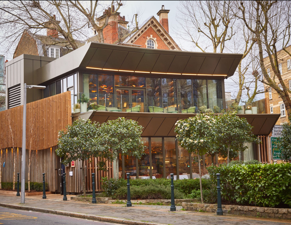 Restaurant Story Bermondsey — exterior with linear LED cantilevered roof lighting