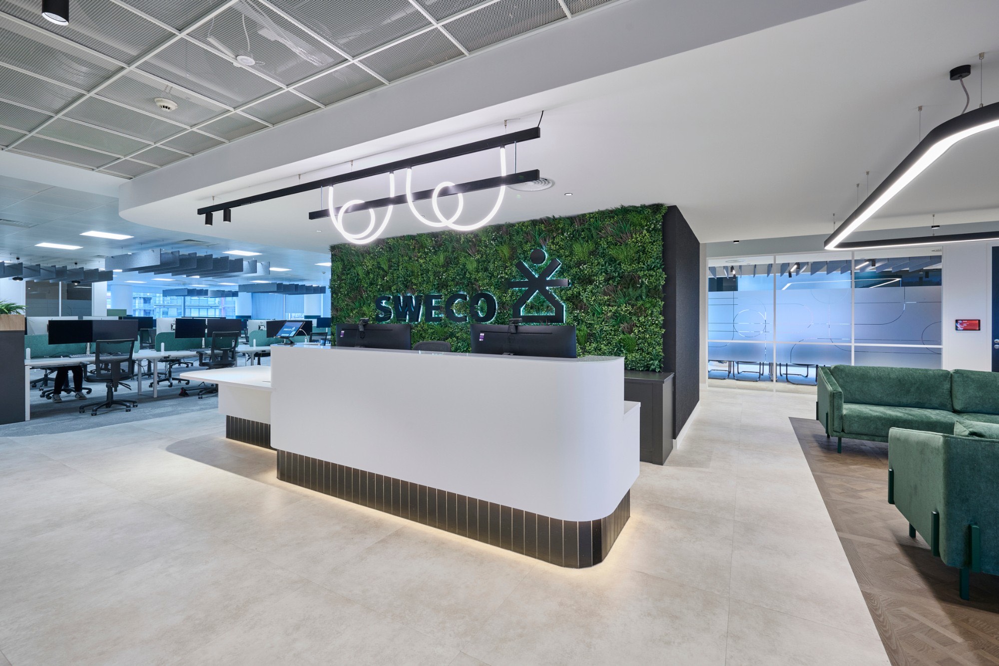 Sweco UK Leeds reception with Aqform Tubeflex lighting and moss wall
