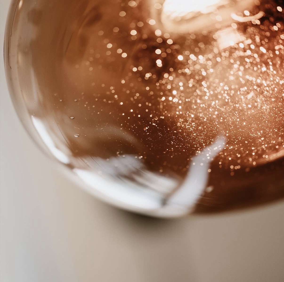 Detail of hand-finished glass with a copper lustre sparkle